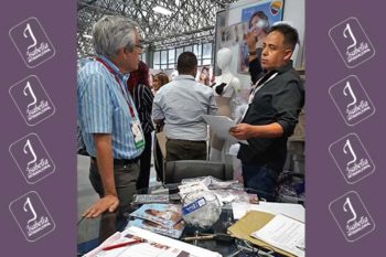 Top view of woman's black bra on the unmade bed
