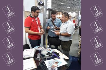 Top view of woman's black bra on the unmade bed